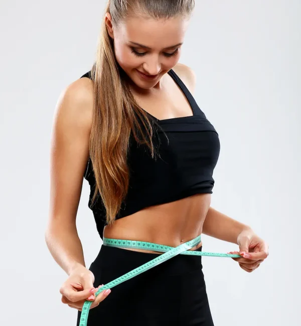 fitness-girl-measuring-her-waist Nutricionista pérdida de peso