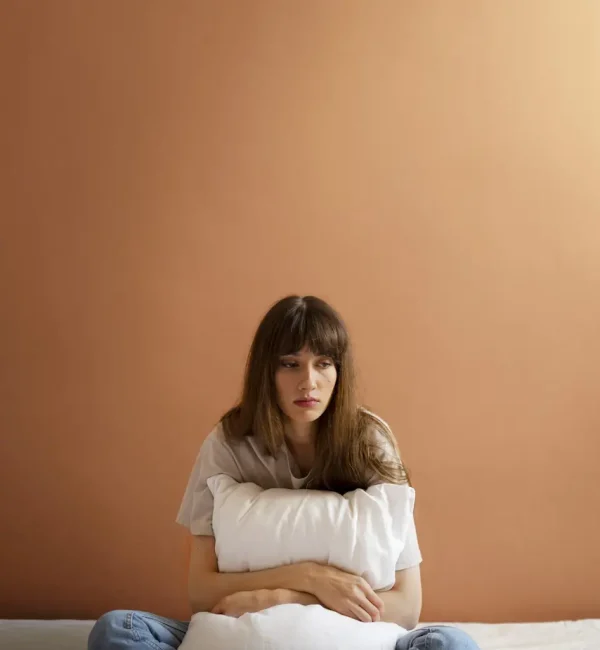 insecure-woman-home-full-shot-scaled